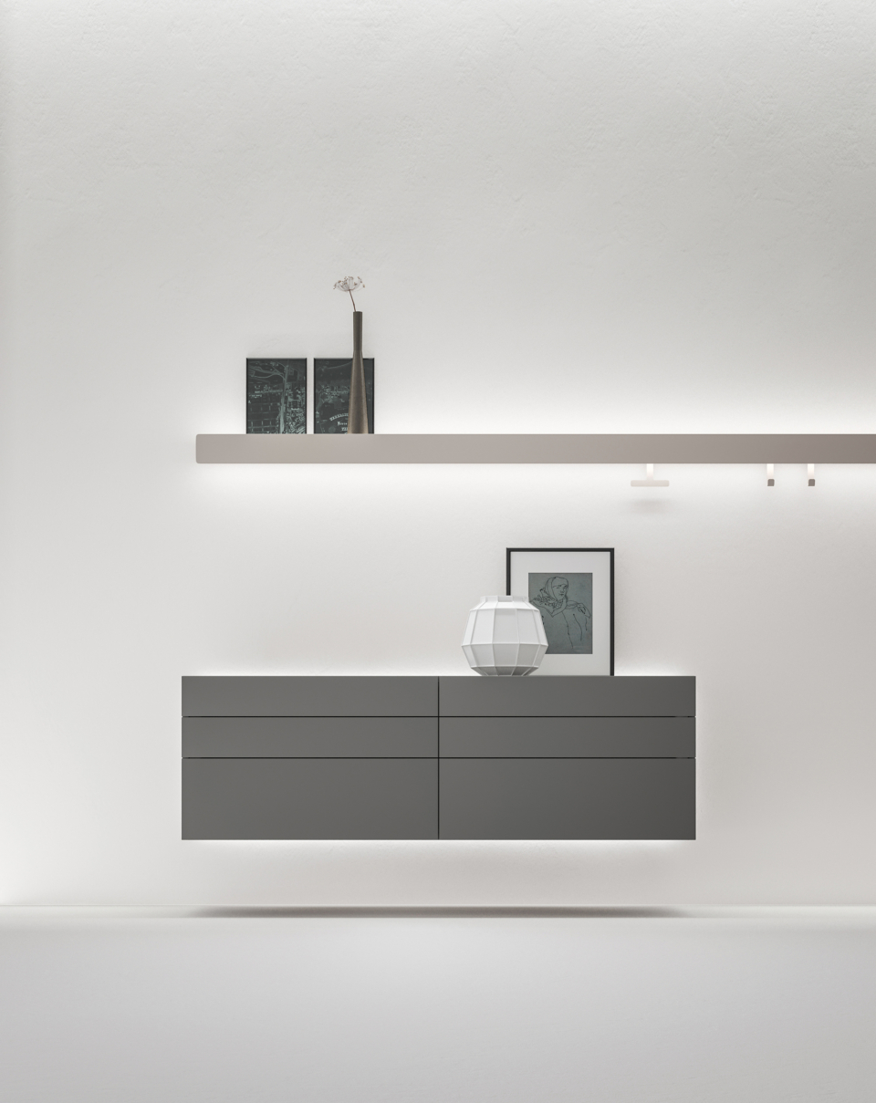 A drawer unit that floats lightly on the wall. The possibility of choosing the height and finish of the drawers offers you the possibility of defining the design of the front, as you wish. The led back, which can be applied to the back of the composition, creates a soft spot of light in the room and can be adjusted in intensity using a convenient remote control.